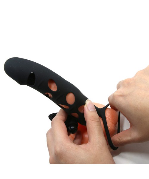 Silicone penis extension with vibrating tickler