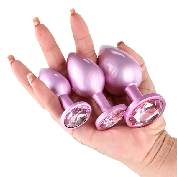 NS Novelties Rear Assets Iridescent Pink Butt Plug Kit — image 2 of 2