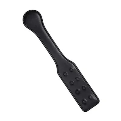 paddle with metal pin spikes