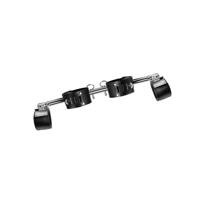 adjustable swiveling spreader bar with leather cuffs
