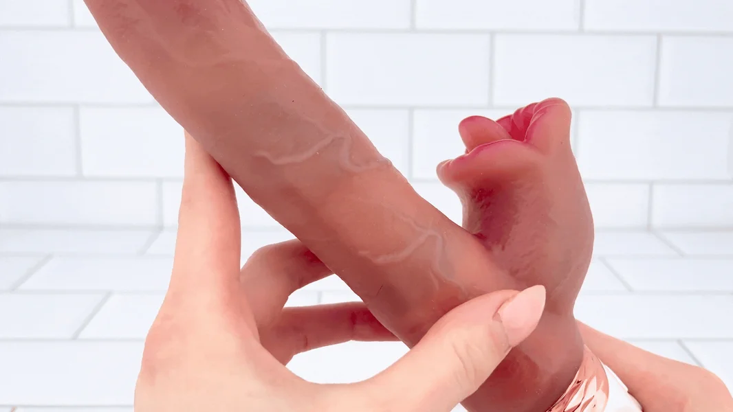 The Symphony of Lust - Heated Thrusting Dildo with Vibrating Clit Licker — image 10 of 16