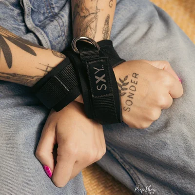 sxy cross cuffs over bound wrist restraints