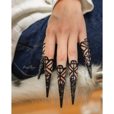 black sensory fingertips 5 metal claws