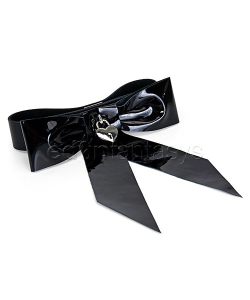 Patent leather bow wrist restraint